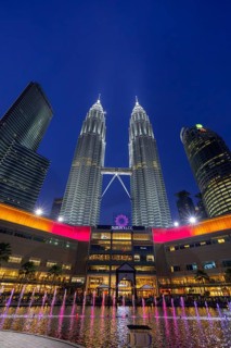Petronas Towers, KLCC Twin Towers, interlinked 88-storey supertall twin skyscrapers illuminated at