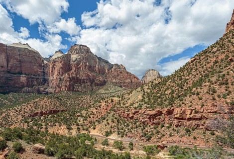 Zion Park Boulevard runs through the valley between rugged mountains in Zion National Park, Utah