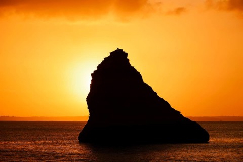 Rocks in the sea at sunrise, Praia Dona Ana, Lagos, Algarve, Portugal