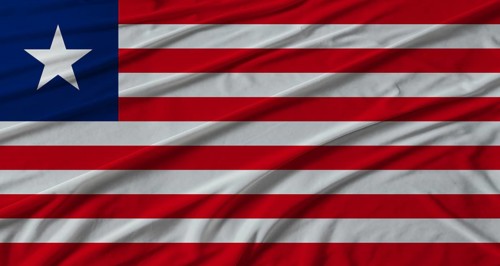 Liberia flag waving. Flag of Liberia with cloth texture