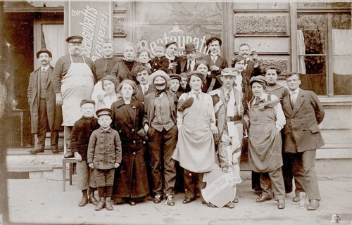 Cooperative brewery, restaurant, tavern, carnival, disguise, group of people posing for a photo in