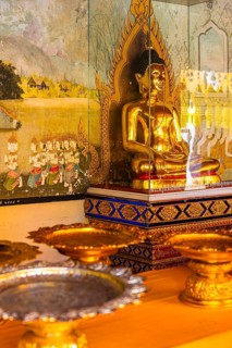 Gilded seated Buddha figure in a glass box, Wat Phra That Doi Suthep temple complex, Chiang Mai,