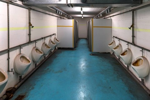 Men's toilet room in the disused nuclear bunker, built for 2, 400 people in the 1970s under
