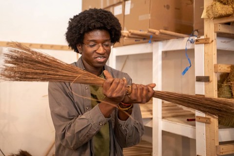 Berea, Kentucky - Aja Haynes makes traditional Appalachian brooms and whiskbrooms by hand at