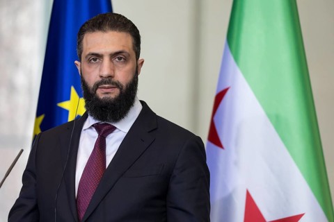 Ahmed al-Sharaa (President of the Syrian Arab Republic) at a joint press conference with Friedrich
