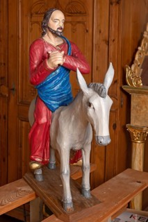 Palm tree, late Gothic figure of Christ, modern donkey, parish church of St. Lawrence, Otzing,
