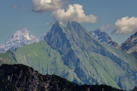 Summer in the Alps, mountain panorama from Fellhorn 2037 m, of the green grassy Höfats, 2259 m,