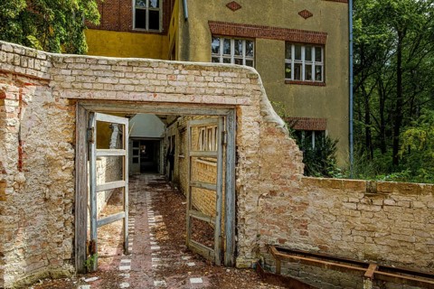 Dilapidated passageway in the former pulmonary sanatorium and lost place Heilstätte Grabowsee,