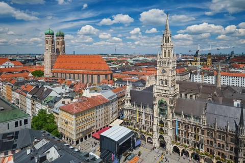 High angle view over the historic Marienplatz square featuring the Neues Rathaus and Frauenkirche