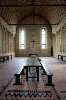 Interior view of the historic refectory, monks' dining room in the famous Benedictine Abbey of Mont