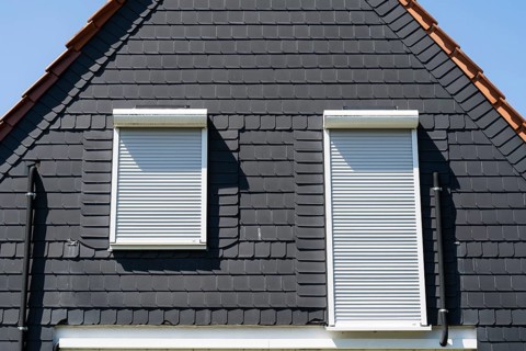 Window with closed shutters in a slate façade, detail, Westphalia, North Rhine-Westphalia, Germany