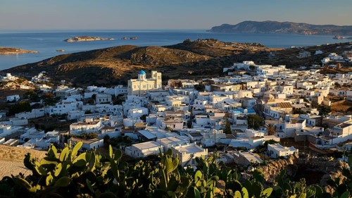 Church, Panagia Odigitria, white houses and a blue domed church on a Greek island with sea view,