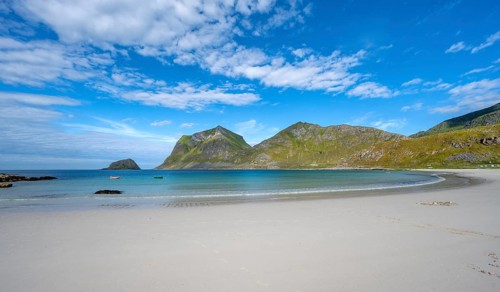 Haukland white sandy beach and green mountains, Vestvågøya, Lofoten, Nordland, Norway