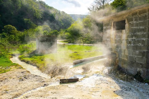 Close up of steaming hot springs in a sunny summer day. Georgia