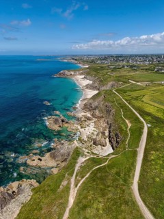 Aerial view of the sandy beach, Plage des Charettes beach north of Pointe Corsen, a cape at the