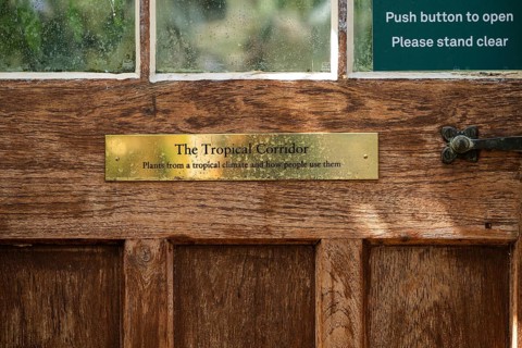Sign on front door, Tropical Corridor, a hot and humid greenhouse simulating a tropical habitat,