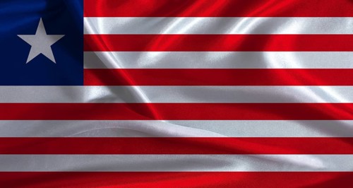 Liberia flag with cloth textured background. National flag of Liberia with realistic texture