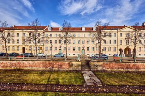 Old city canal, drained historic canal, historic residential buildings, residential buildings,