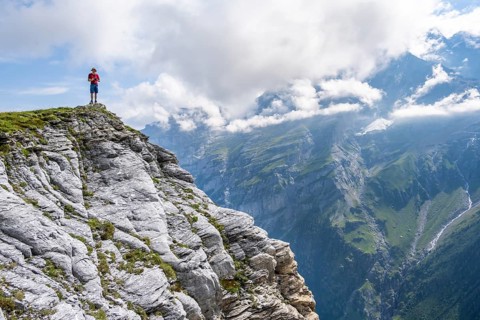 Mountaineers on Tanzbödeli summit in front of mountain landscape, Bernese Alps, Bernese Oberland,