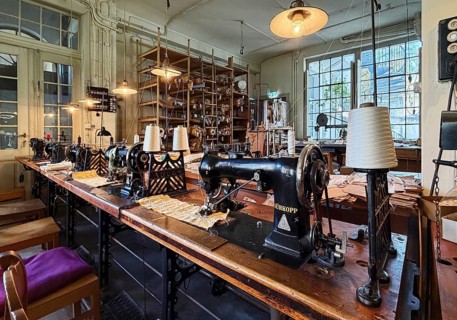 Museum laundry factory, sewing room, industrial sewing machines and knitting machines come almost