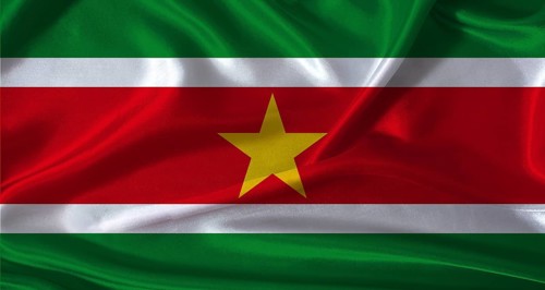 National flag of Suriname with cloth texture. Suriname flag with realistic texture background