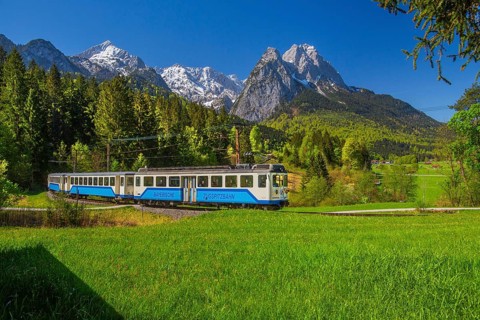Bavarian Zugspitzbahn rack railway in front of Alpspitze 2628 m and Waxenstein 2277 m in spring,