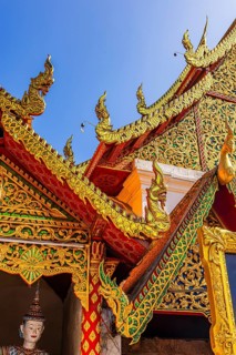 Curved roof beams, chofas, with gilded wood ornaments, Wat Phra That Doi Suthep temple complex,