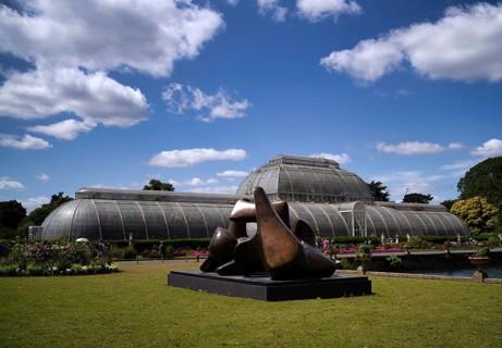 Palm house, tropical house, in front of Vertebrae sculpture by Henry Moore, consisting of three