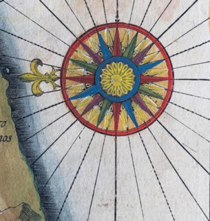 Old coloured map of Ceylon or Sri Lanka decorated with compass rose, by Jodocus Hondius from the