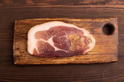 Dry-aged steak, Pork ham on brown wooden background. top view, flat lay, close up