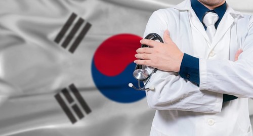 South Korean national health system, Medical professional holding sthetoscope isolated