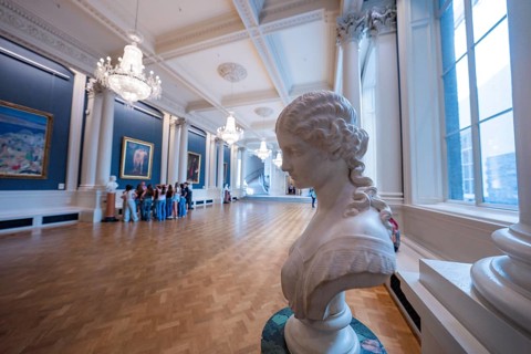 Art gallery with classic marble bust and magnificent chandeliers on the ceiling, National Gallery