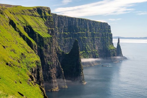 View of the steep cliffs of Liraberg, Skopun, Sandoy Island, Faroe Islands, Denmark