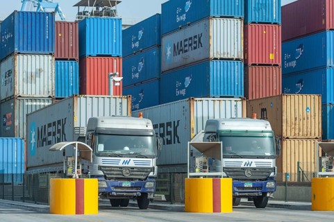 Abu Dhabi, United Arab Emirates. June 23rd 2019 Mearsk company shipping containers being loaded