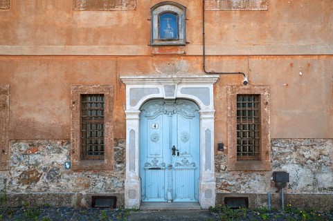 Entrance portal from 1799 of an empty town house, Ostritz, Upper Lusatia, Saxony, Germany