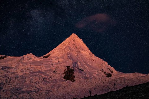 Alpamayo with alpamayo glacier against a starry sky, 5947 m, with the title of most beautiful
