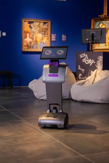 A robot with a fly is in an artistic exhibition, museum robot Robolutions in the Christian Schad