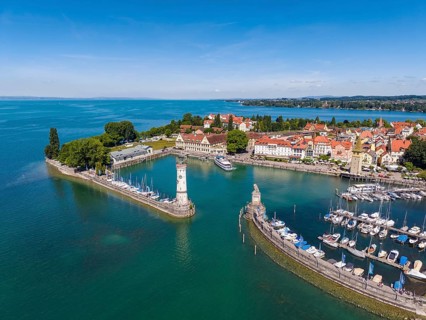 Aerial view of Lindau island in Lake Constance with the lighthouse and the Bavarian lions at the