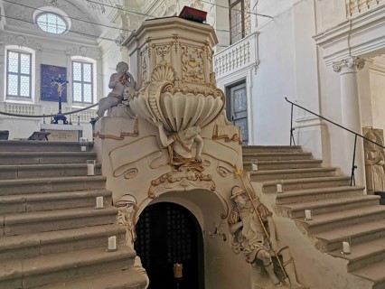 Entrance to the crypt and pulpit in the baroque castle church of St. Michael in the Castle,