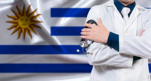 Uruguayan national health system, Medical professional holding sthetoscope isolated