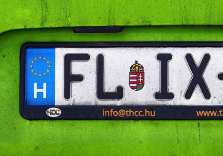 Car license plate FL IX of a FlixBus from Hungary with the characteristic green color, detail,