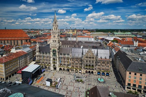 Elevated perspective of the gothic Neues Rathaus and the bustling Marienplatz square on a sunny