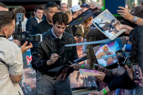 Nicholas Galitzine signs autographs - German premiere of MASTERS OF THE UNIVERSE, Uber Platz,