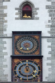 Two tower clocks at the old town hall tower, below 1527 above 1584, above the roaring lion,