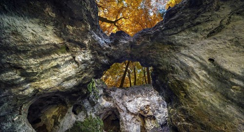 Versturzhöhle Riesenburg, cave ruin with autumn forest, Wiesenttal, Upper Franconia, Bavaria,