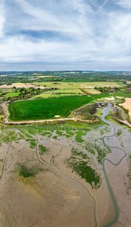 Panorama of Fields and Farms over Bosham Quay from a drone, Chichester Harbour National Landscape,