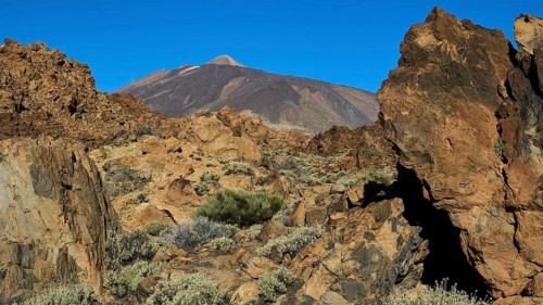 Barren, rocky volcanic landscape under a clear blue sky, Teide, Parque Nacional del Teide, Teide