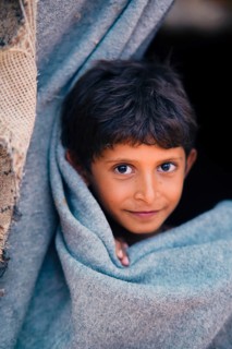 Yemeni children living in a refugee camp under difficult humanitarian conditions. Yemen, April 12,