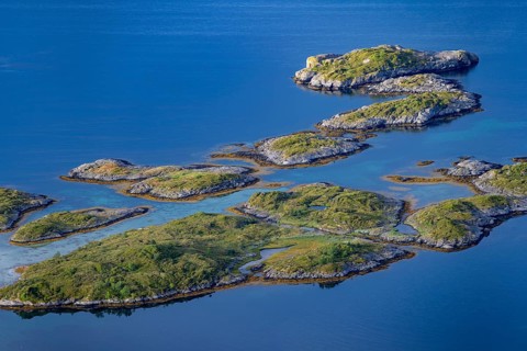 View of archipelago islands in the fjord, view of Raftsund fjord with mountains, view from the