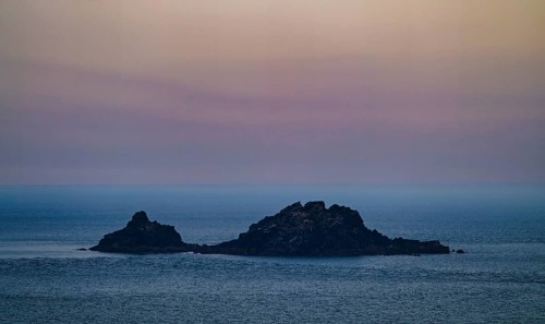 Rock formation, island, The Brisons, popularly often Charles de Gaulle lying in the bathtub, Cape